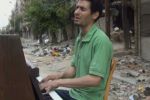 رحلة عازف بيانو بمخيم اليرموك إلى اليونان