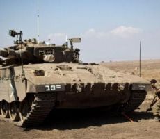 إسرائيل تهدد بقصف سوريا
