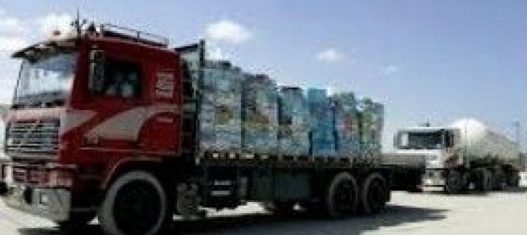  اسرائيل تسمح بادخال 250 شاحنة عبر كرم ابو سالم
