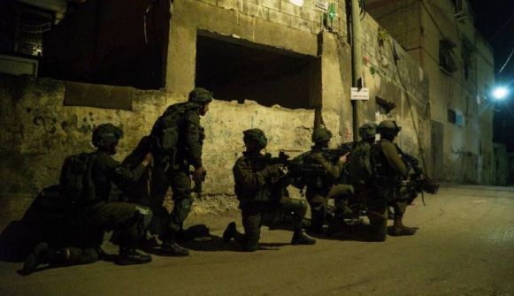 اعتقال 22 فلسطينياً وضبط أسلحة بالضفة
